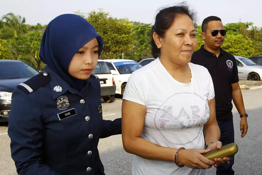 Maria Elvira Pinto Exposto, în momentul în care a fost arestată pe aeroportul din Kuala Lumpur / foto: EPA