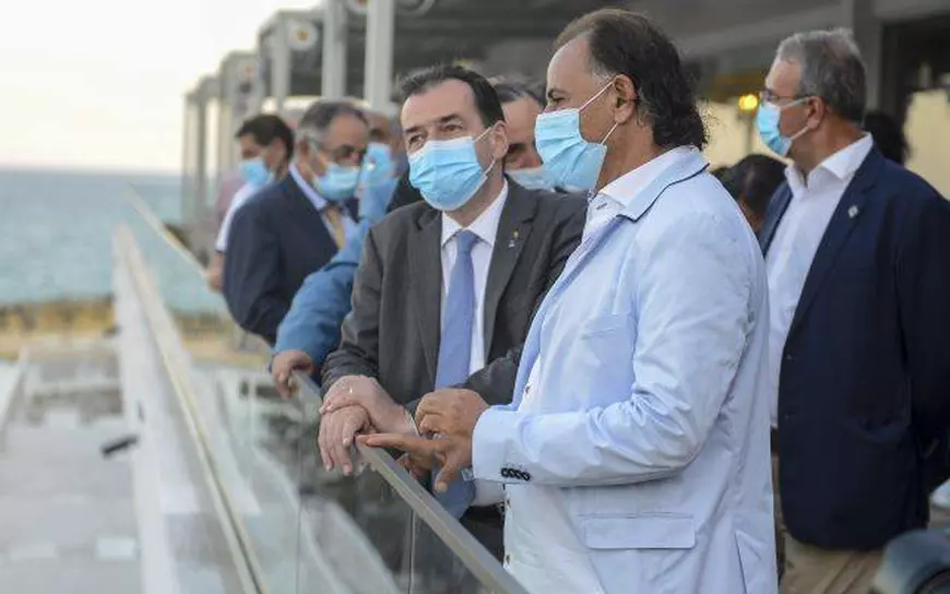 Candidatul-surpriză la Primăria Constanța, Mohammad Murad, regulamentar cu Orban, dar cu masca pusă de formă după plecarea premierului!