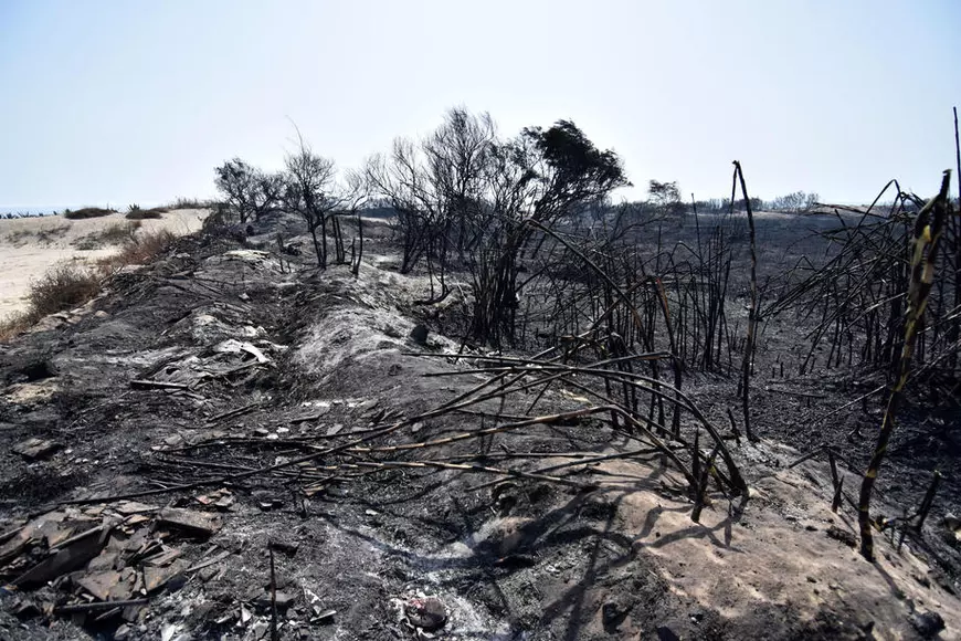 Italia, lovită de inundații în nord și de incendii în sud