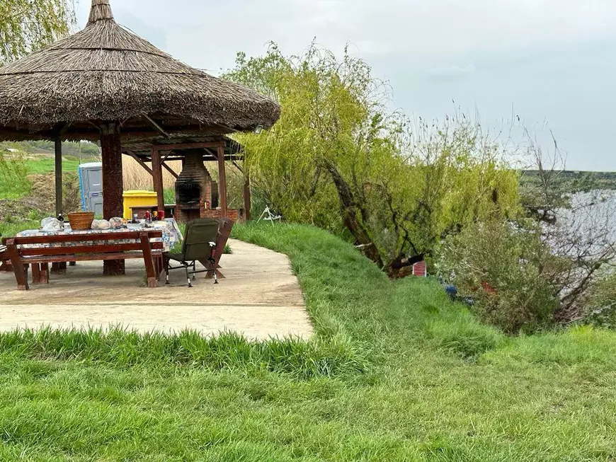 EXCLUSIV. Cum l-a prins DNA în flagrant pe Dumitru Buzatu: a fost trădat la o partidă de pescuit de omul lui de casă, Farmazon, regele asfaltului din Vaslui 