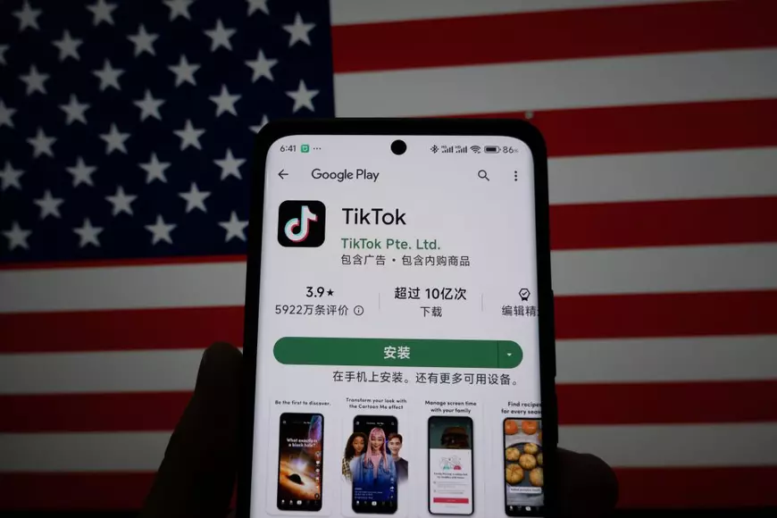 SHANGHAI, CHINA - MARCH 13, 2024 - A citizen checks the mobile installation page of the TikTok app on his mobile phone in Shanghai, China, March 13, 2024.
