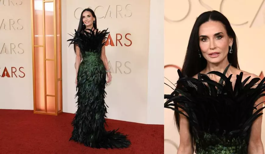 Demi Moore a pășit pe covorul roșu într-o rochie Gucci verde, cu pene, dramatică.