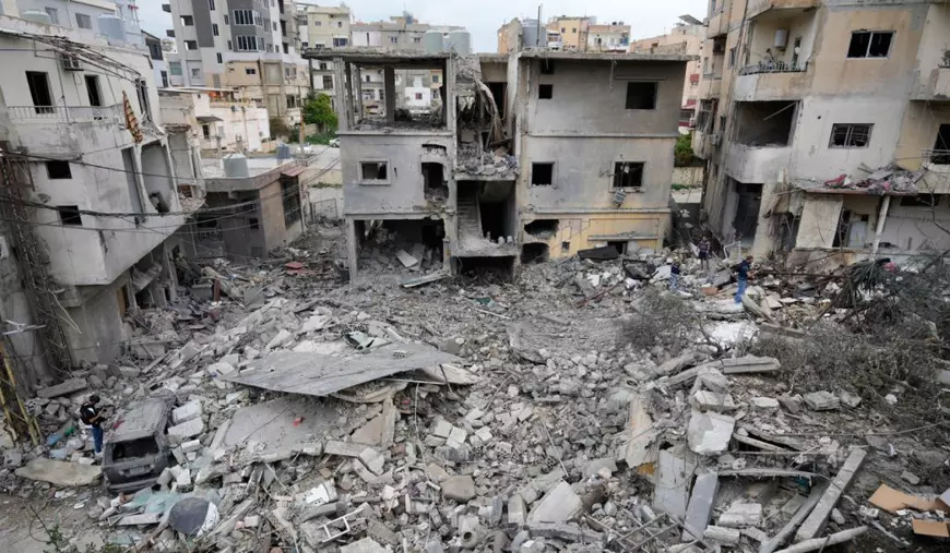 O fotografie în care mai multe blocuri și clădiri sunt distruse sau în ruină, din cauza războiului Iran-Israel-SUA.