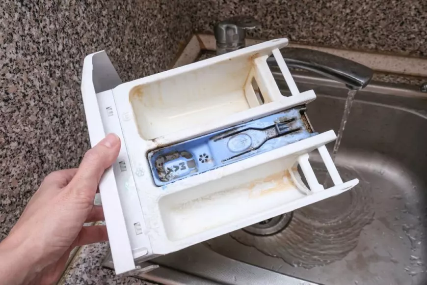 Cum să curețu sertarul de detergent de la mașina de spălat - Foto Shutterstock.com