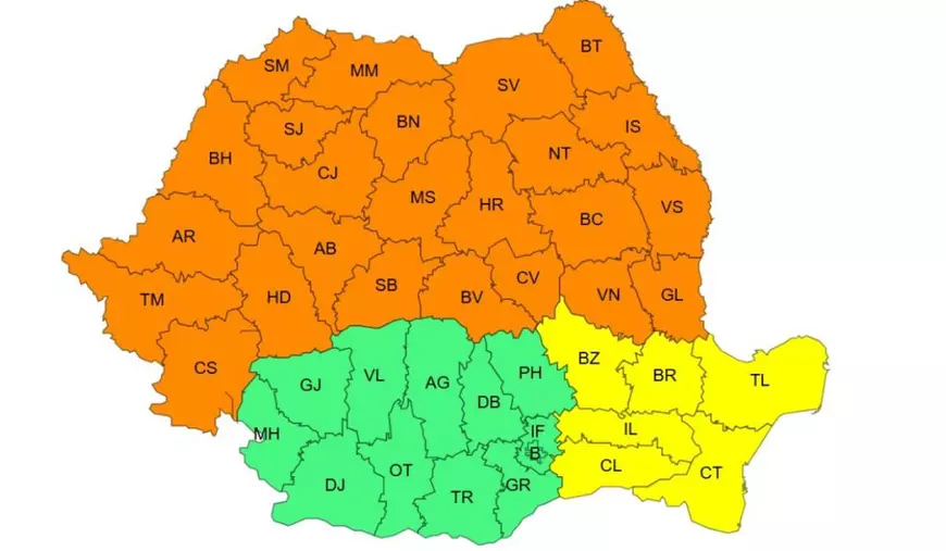 Harta României pe județe colorate cu portocaliu, galben și verde, care arată o avertizare de caniculă, pe 1 iulie 2026