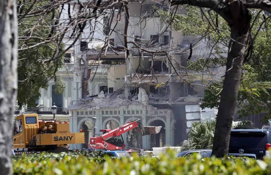 A strong explosion seriously damages a hotel in downtown Havana